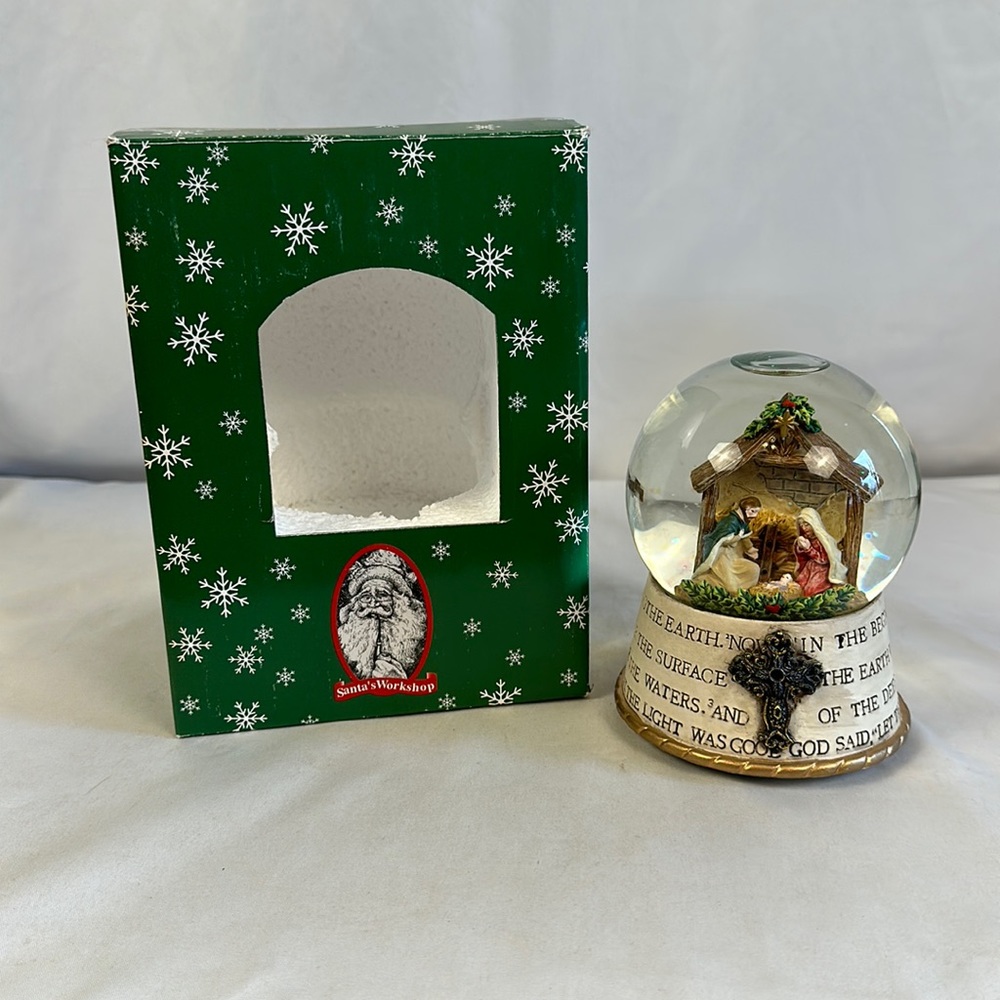 Santa’s Workshop Nativity Musical Snow globe.